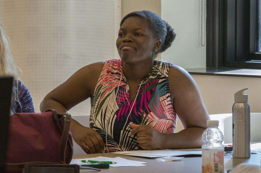 Graduate Student at a table